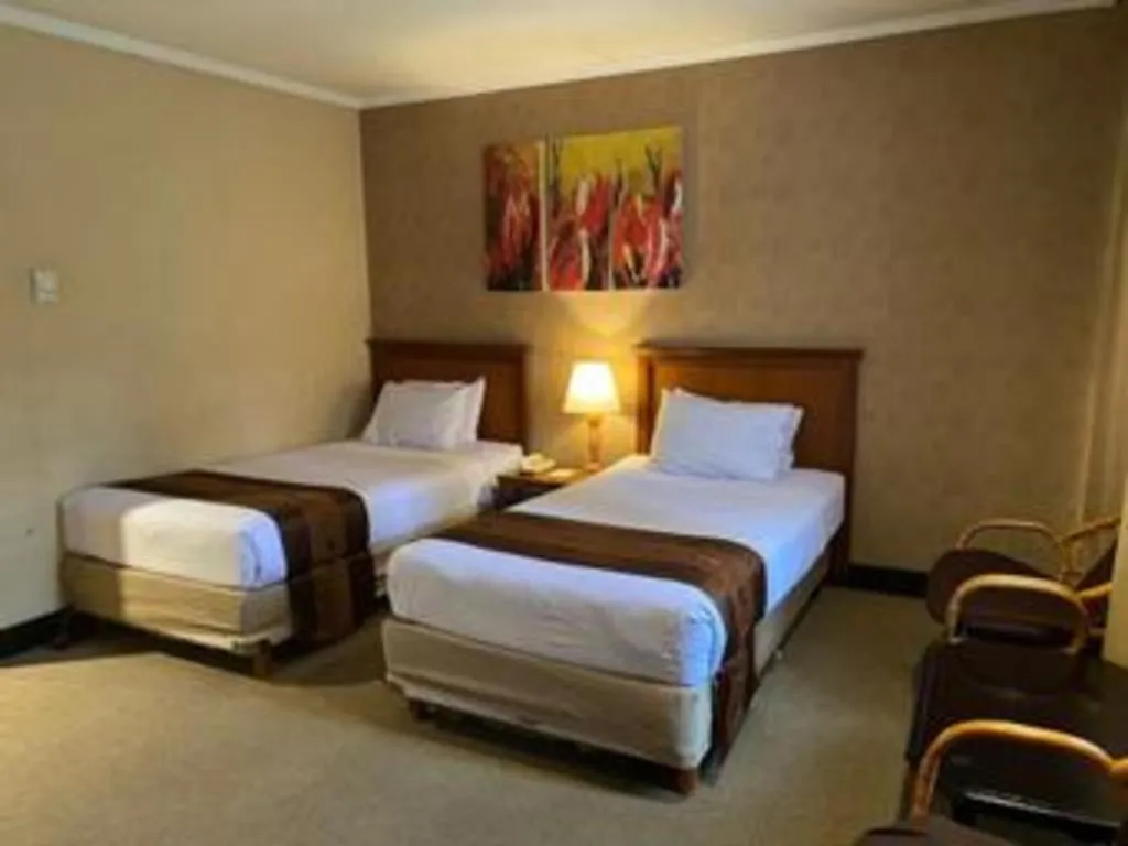 Bed in Regent's Park Hotel at Kayutangan Malang