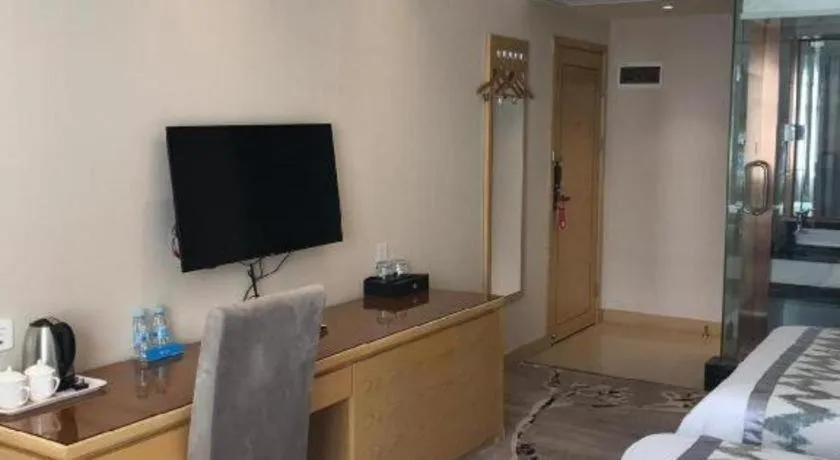 Bed in ST. MORITZ BUSINESS HOTEL