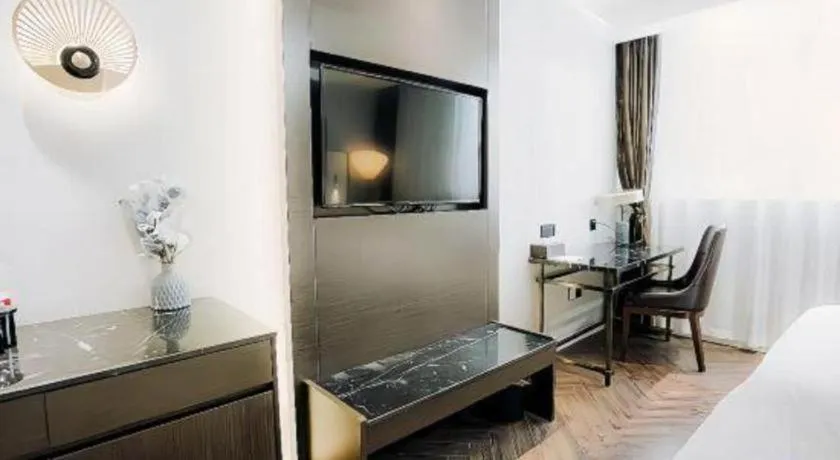 Bed in Jinjiang Metropolo Hotel Nanjing Jiangning Binjiang Development Zone