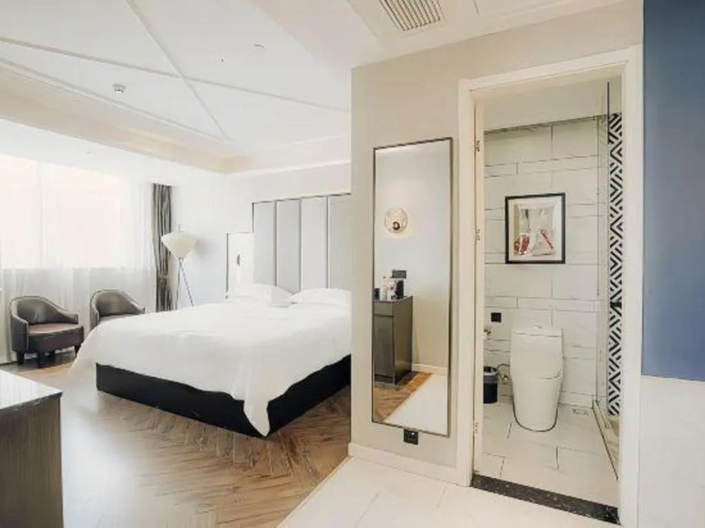 Bed in Jinjiang Metropolo Hotel Nanjing Jiangning Binjiang Development Zone