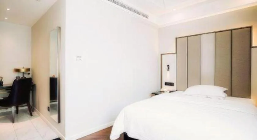 Bed in Jinjiang Metropolo Hotel Nanjing Jiangning Binjiang Development Zone