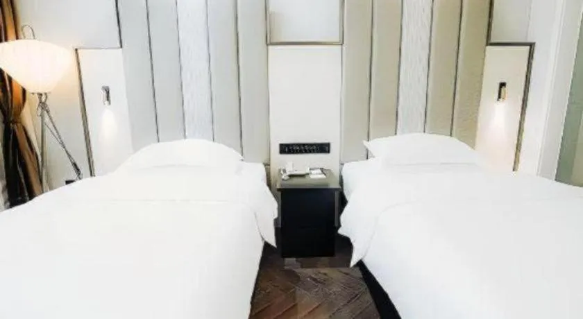 Bed in Jinjiang Metropolo Hotel Nanjing Jiangning Binjiang Development Zone