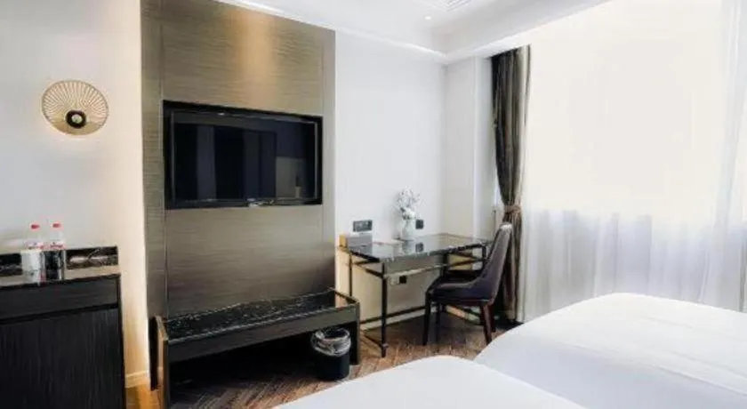 Bed in Jinjiang Metropolo Hotel Nanjing Jiangning Binjiang Development Zone