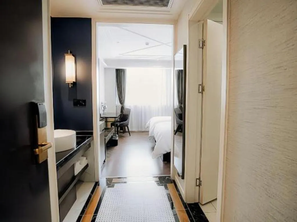 Bed in Jinjiang Metropolo Hotel Nanjing Jiangning Binjiang Development Zone