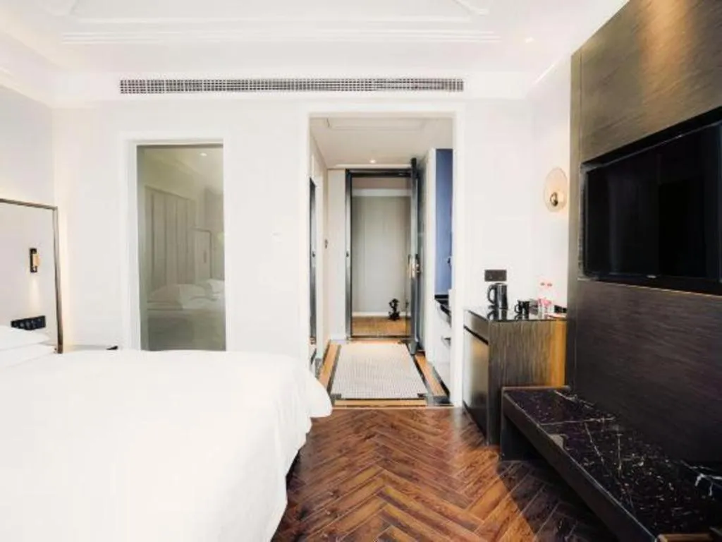 Bed in Jinjiang Metropolo Hotel Nanjing Jiangning Binjiang Development Zone