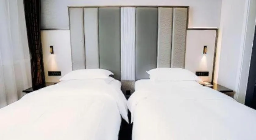 Bed in Jinjiang Metropolo Hotel Nanjing Jiangning Binjiang Development Zone