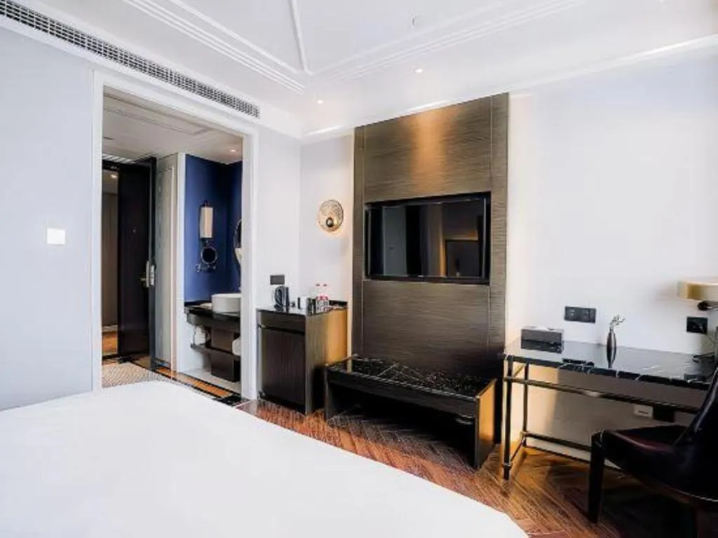 Bed in Jinjiang Metropolo Hotel Nanjing Jiangning Binjiang Development Zone