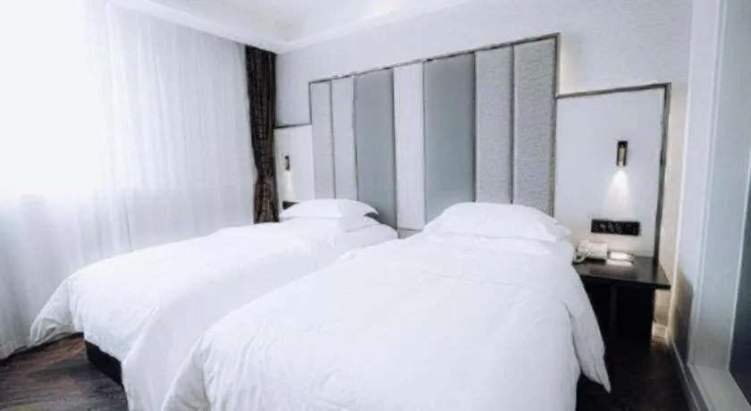 Bed in Jinjiang Metropolo Hotel Nanjing Jiangning Binjiang Development Zone