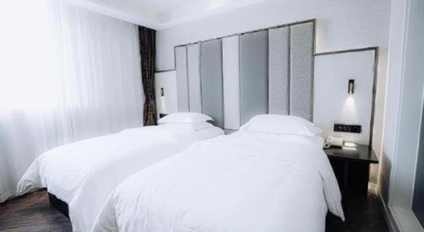 Bed in Jinjiang Metropolo Hotel Nanjing Jiangning Binjiang Development Zone