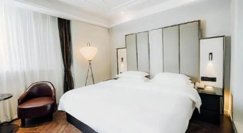 Bed in Jinjiang Metropolo Hotel Nanjing Jiangning Binjiang Development Zone