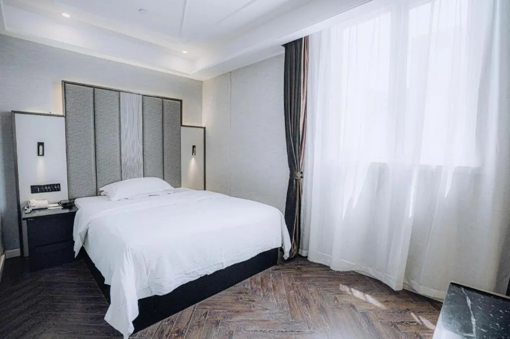 Bed in Jinjiang Metropolo Hotel Nanjing Jiangning Binjiang Development Zone