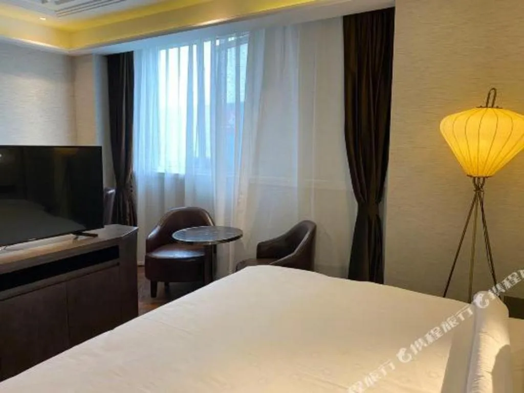 Bed in Jinjiang Metropolo Hotel Nanjing Jiangning Binjiang Development Zone