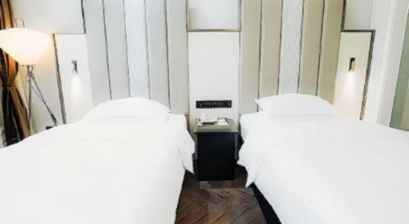 Bed in Jinjiang Metropolo Hotel Nanjing Jiangning Binjiang Development Zone