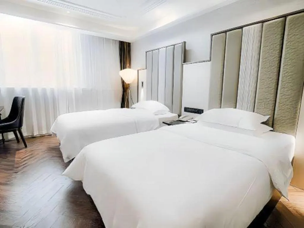Bed in Jinjiang Metropolo Hotel Nanjing Jiangning Binjiang Development Zone