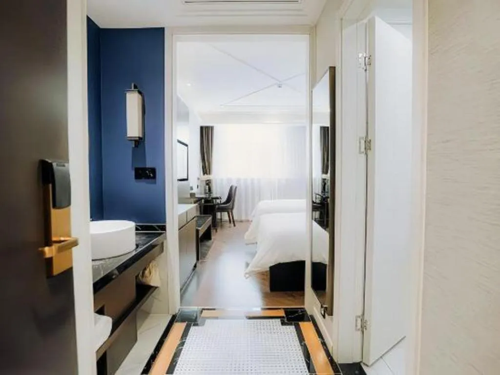 Bed in Jinjiang Metropolo Hotel Nanjing Jiangning Binjiang Development Zone