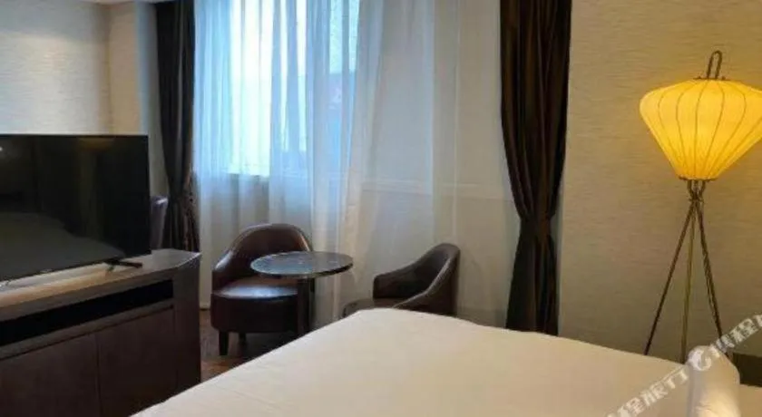 Bed in Jinjiang Metropolo Hotel Nanjing Jiangning Binjiang Development Zone