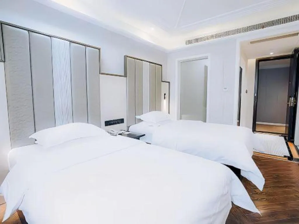 Bed in Jinjiang Metropolo Hotel Nanjing Jiangning Binjiang Development Zone