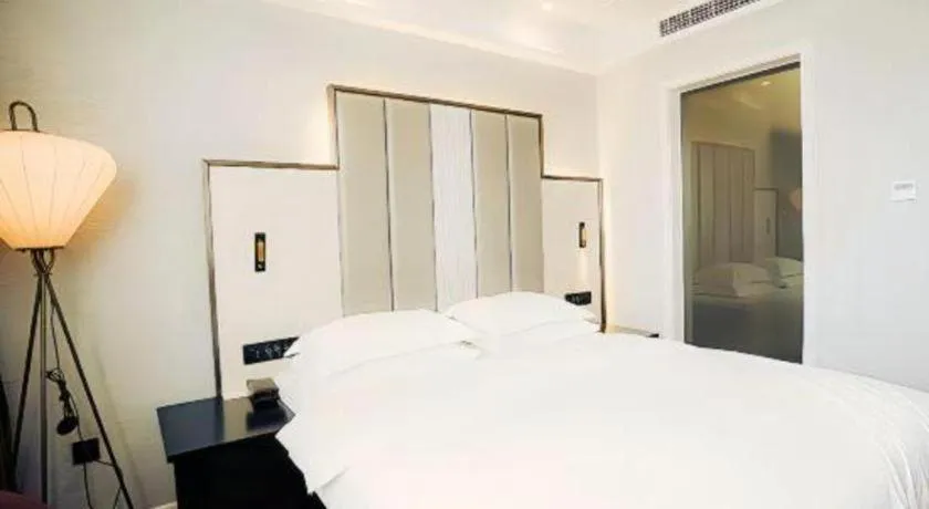 Bed in Jinjiang Metropolo Hotel Nanjing Jiangning Binjiang Development Zone