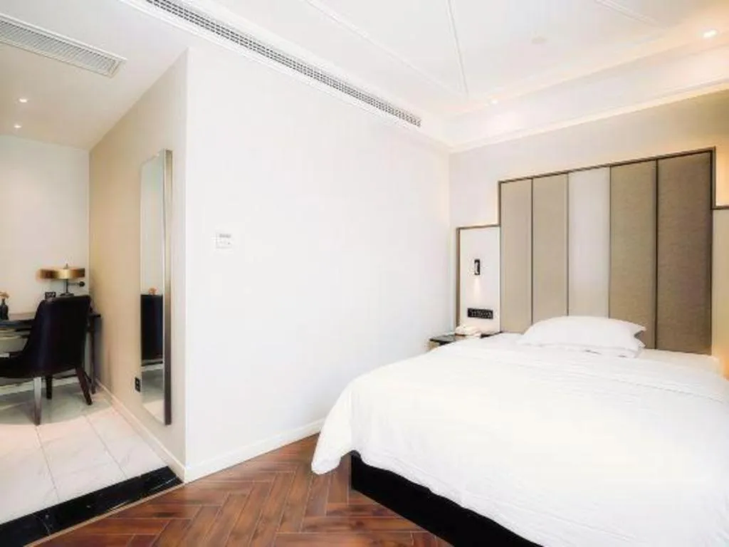 Bed in Jinjiang Metropolo Hotel Nanjing Jiangning Binjiang Development Zone