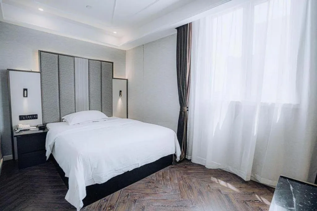 Bed in Jinjiang Metropolo Hotel Nanjing Jiangning Binjiang Development Zone