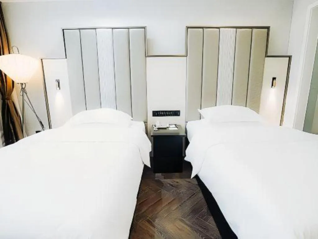 Bed in Jinjiang Metropolo Hotel Nanjing Jiangning Binjiang Development Zone