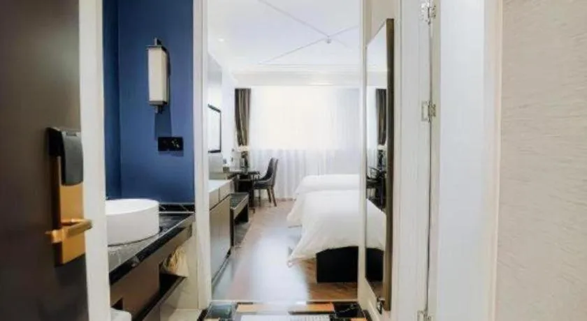 Bed in Jinjiang Metropolo Hotel Nanjing Jiangning Binjiang Development Zone