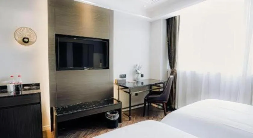 Bed in Jinjiang Metropolo Hotel Nanjing Jiangning Binjiang Development Zone