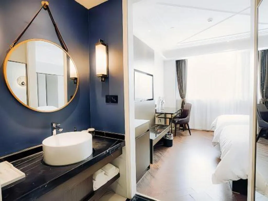 Bed in Jinjiang Metropolo Hotel Nanjing Jiangning Binjiang Development Zone