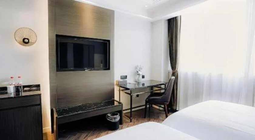Bed in Jinjiang Metropolo Hotel Nanjing Jiangning Binjiang Development Zone