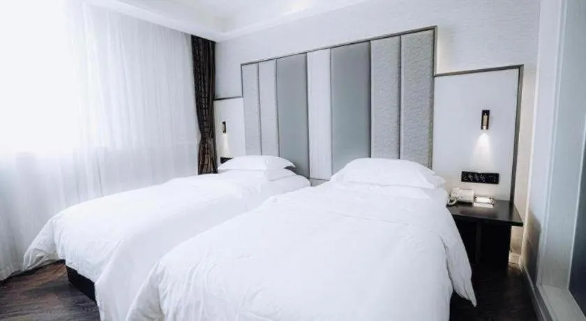 Bed in Jinjiang Metropolo Hotel Nanjing Jiangning Binjiang Development Zone