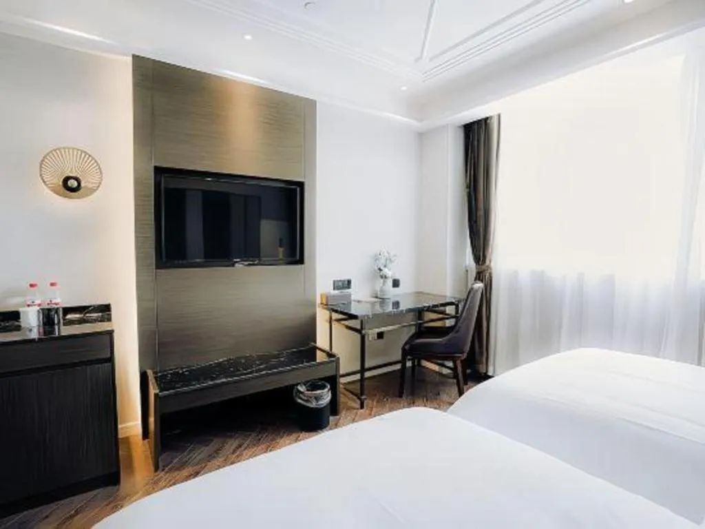 Bed in Jinjiang Metropolo Hotel Nanjing Jiangning Binjiang Development Zone