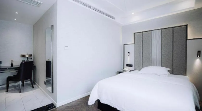 Bed in Jinjiang Metropolo Hotel Nanjing Jiangning Binjiang Development Zone