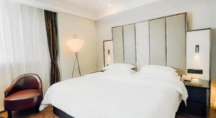 Bed in Jinjiang Metropolo Hotel Nanjing Jiangning Binjiang Development Zone