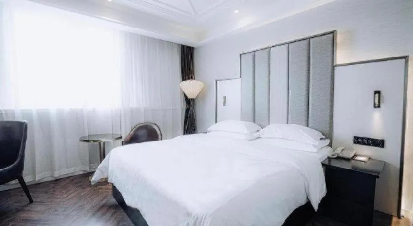 Bed in Jinjiang Metropolo Hotel Nanjing Jiangning Binjiang Development Zone