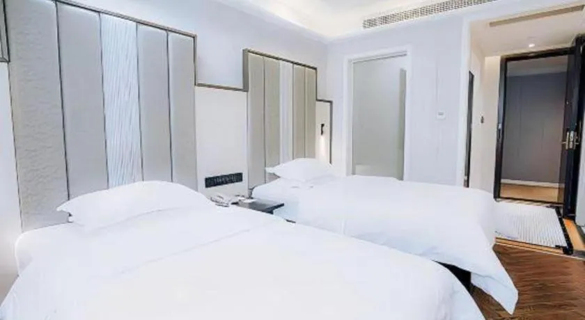 Bed in Jinjiang Metropolo Hotel Nanjing Jiangning Binjiang Development Zone