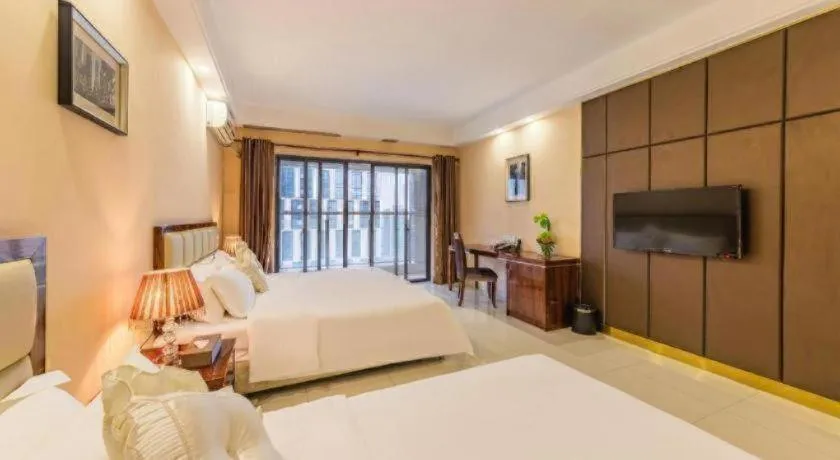 Bed in Foshan Baolong Hotel