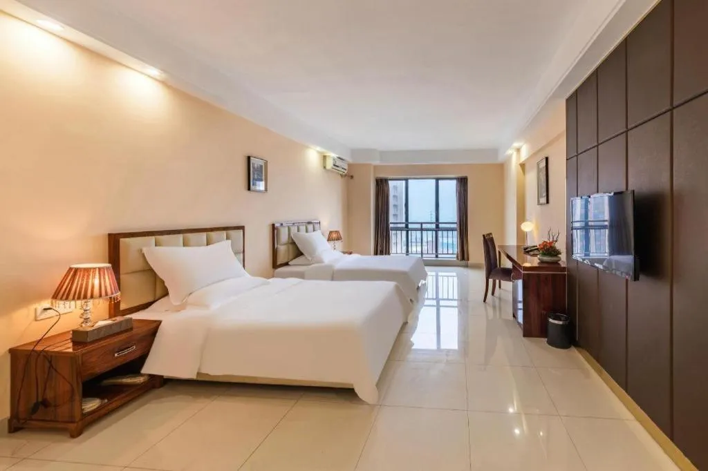 Bed in Foshan Baolong Hotel