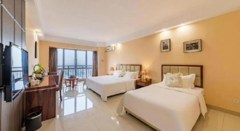 Bed in Foshan Baolong Hotel