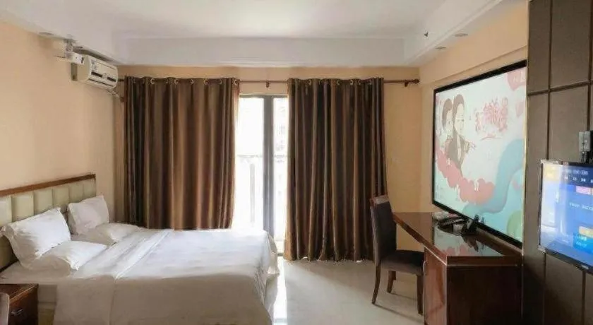 Bed in Foshan Baolong Hotel