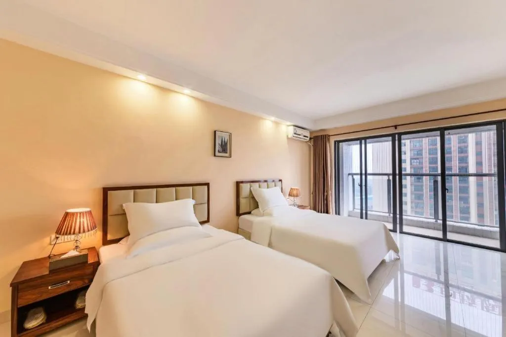 Bed in Foshan Baolong Hotel