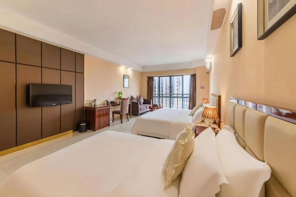 Bed in Foshan Baolong Hotel