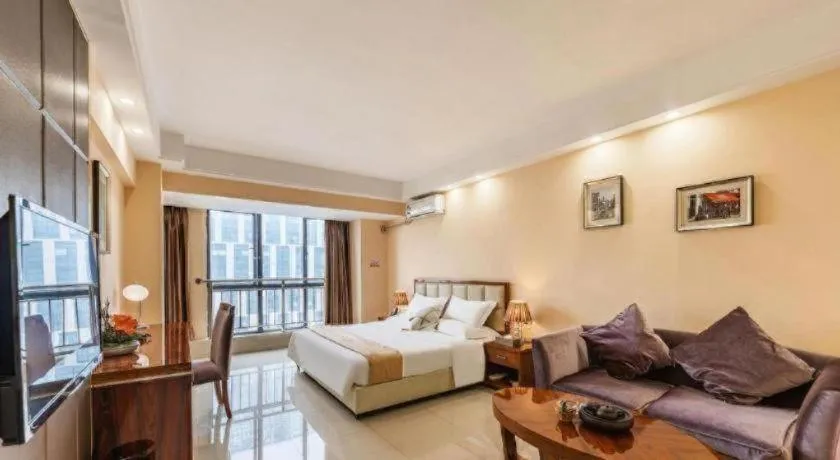 Bed in Foshan Baolong Hotel