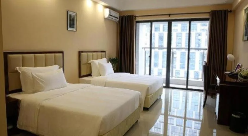 Bed in Foshan Baolong Hotel