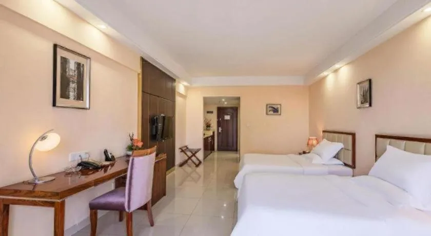 Bed in Foshan Baolong Hotel