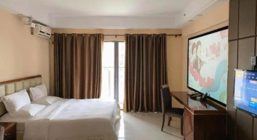 Bed in Foshan Baolong Hotel