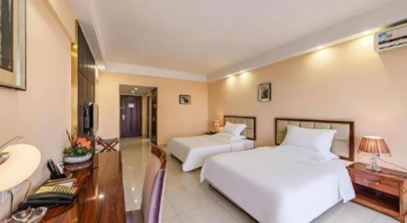 Bed in Foshan Baolong Hotel