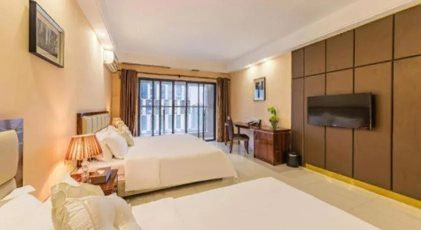 Bed in Foshan Baolong Hotel