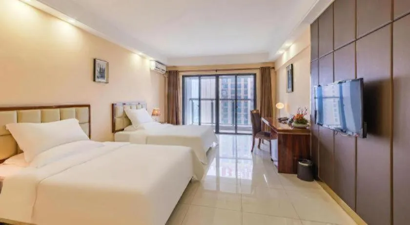 Bed in Foshan Baolong Hotel