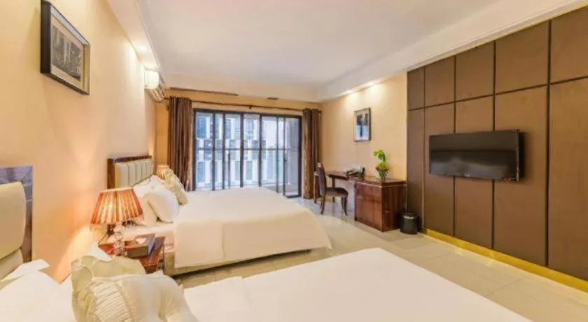Bed in Foshan Baolong Hotel