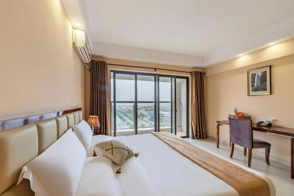 Bed in Foshan Baolong Hotel